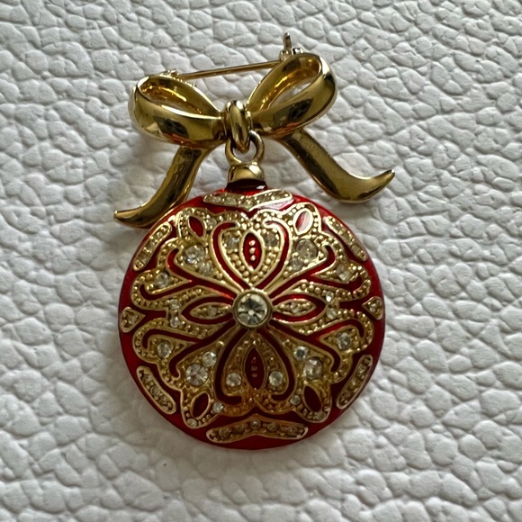 Monet Jewelry - Monet Red Enameled white rhinestone Christmas Ornament pin with a gold tone bow